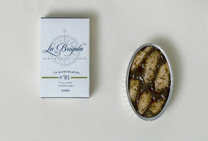 Petits calamars dans leur encre - La Brújula - enboite.ch